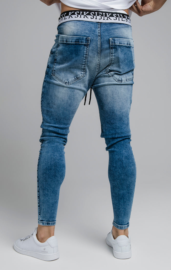 Laad de afbeelding in de Galerij viewer, Blue Distressed Elasticated Jean (2)