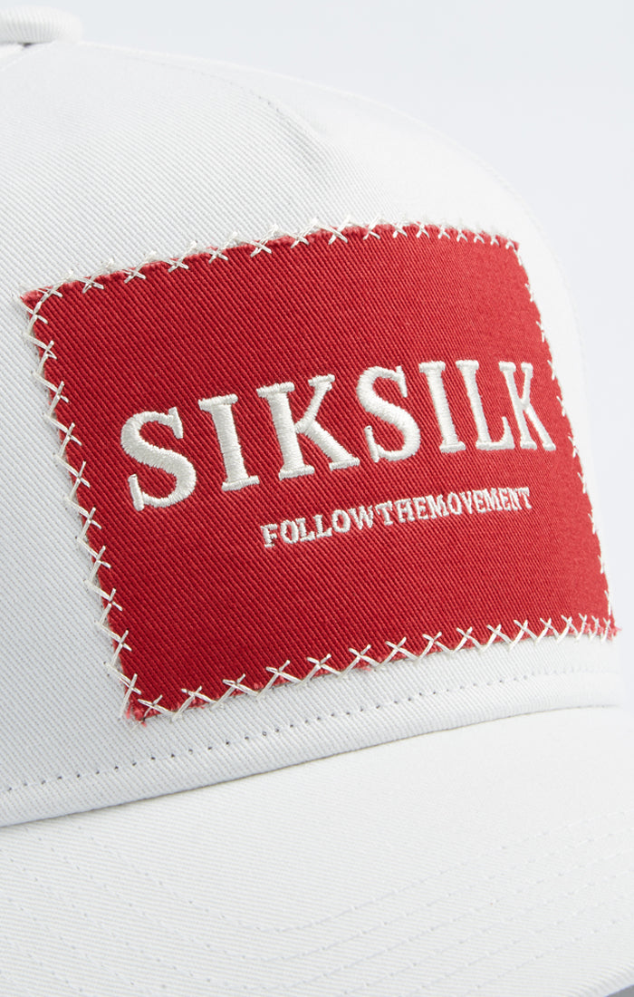 Laad de afbeelding in de Galerij viewer, SikSilk Vintage Cross Stitch Trucker - White (3)