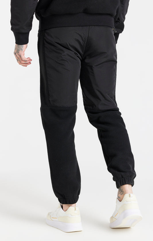 Pantalón híbrido SikSilk Pro con tobillos elásticos - Negro