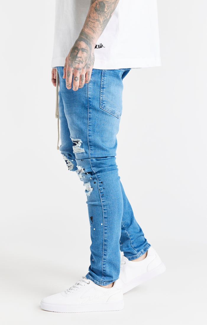 Laad de afbeelding in de Galerij viewer, Blue Distressed Basic Cut Jean (1)